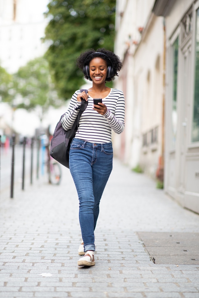 A woman walks outside
