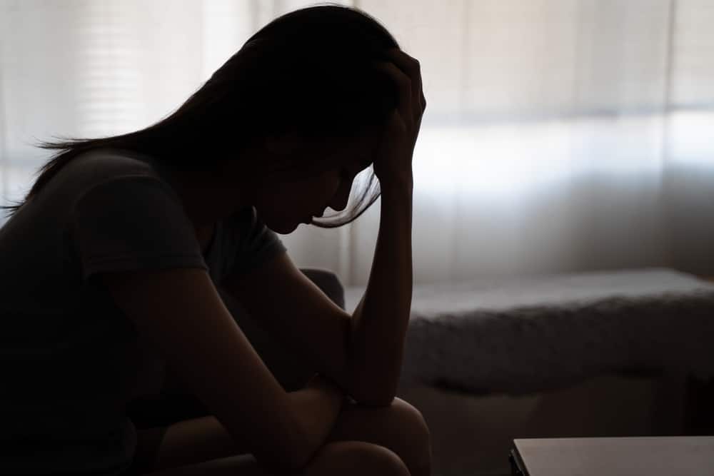 A woman looks upset.