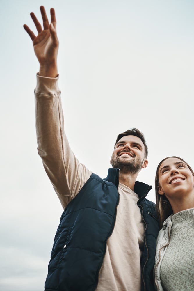 A man and woman outside